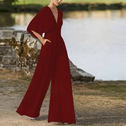 AS | Elegantní kombinéza s výstřihem do V